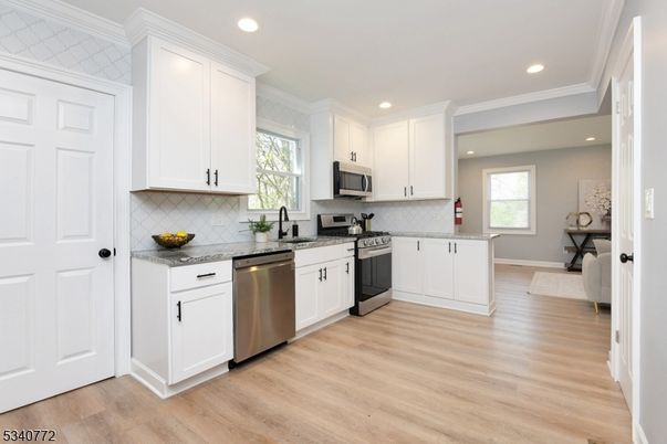Interior, Kitchen, Recessed Lighting, Stainless Steel Appliances, Wood Texture Flooring
