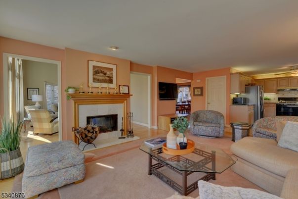 Fireplace, Interior, Kitchen, Living room, Recessed Lighting, Stainless Steel Appliances, Wood Texture Flooring