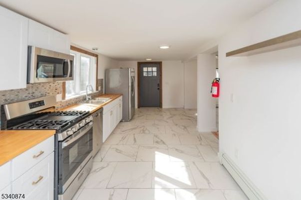 Interior, Kitchen, Marble, Pendant Lights, Recessed Lighting, Stainless Steel Appliances