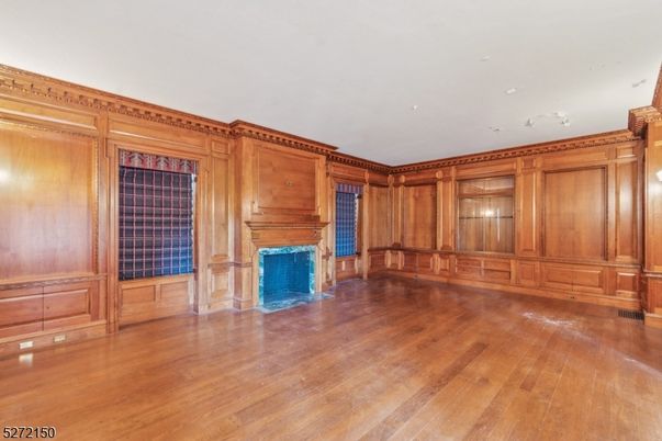 Empty room, Fireplace, Interior, Recessed Lighting, Wood Texture Flooring, Wooden Walls