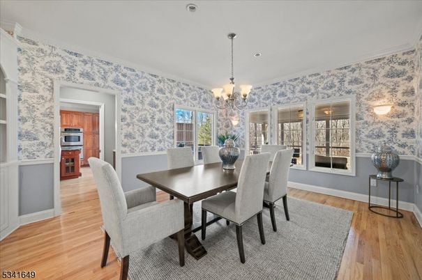 Chandelier, Dining room, Interior, Kitchen, Recessed Lighting, Stainless Steel Appliances, Wood Texture Flooring