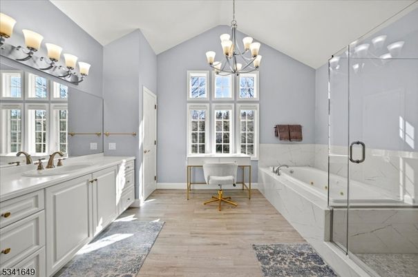 Bathroom, Chandelier, Glass Shower, Interior, Marble Walls, Wood Texture Flooring