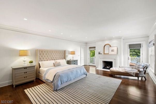 Bedroom, Fireplace, Interior, Recessed Lighting, Wood Texture Flooring