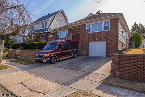 Attached, Exterior, Facade, Brick Facade, Cape Cod