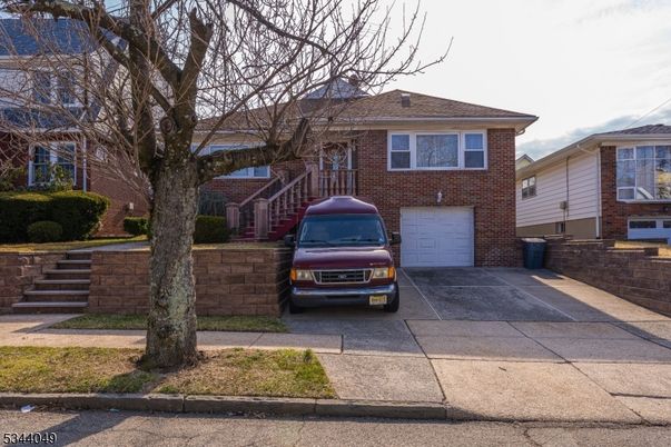 Attached, Exterior, Facade, Brick Facade, American Foursquare