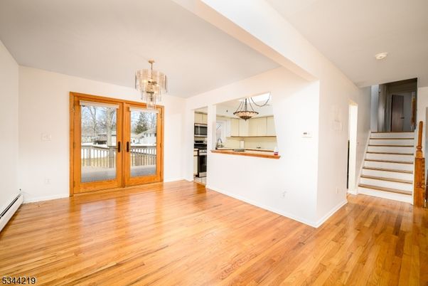 Chandelier, Interior, Kitchen, Stainless Steel Appliances, Wood Texture Flooring