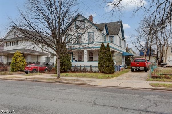 Attached, Exterior, Facade, Tudor Revival