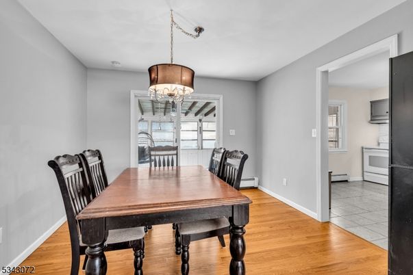 Chandelier, Dining room, Interior, Wood Texture Flooring