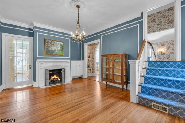 Chandelier, Empty room, Fireplace, Interior, Pendant Lights, Wood Texture Flooring