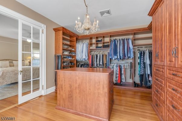 Bedroom, Chandelier, Interior, Walk-in Closets, Wood Texture Flooring