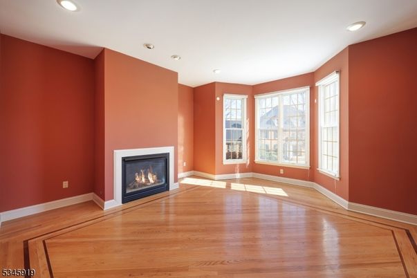 Empty room, Fireplace, Interior, Recessed Lighting, Wood Texture Flooring