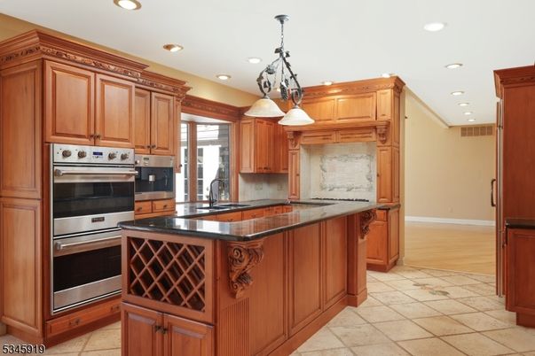 Chandelier, Interior, Kitchen, Pendant Lights, Recessed Lighting, Stainless Steel Appliances, Wood Texture Flooring