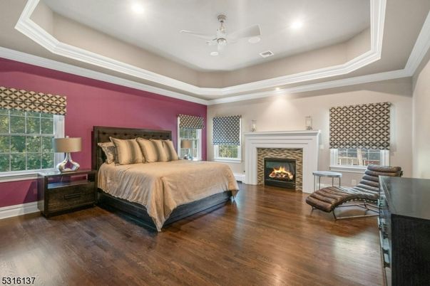 Bedroom, Fireplace, Interior, Recessed Lighting, Wood Texture Flooring