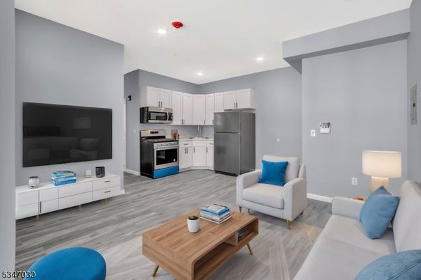 Interior, Kitchen, Living room, Recessed Lighting, Stainless Steel Appliances, Wood Texture Flooring