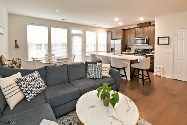 Dining room, Interior, Kitchen, Living room, Recessed Lighting, Stainless Steel Appliances, Wood Texture Flooring