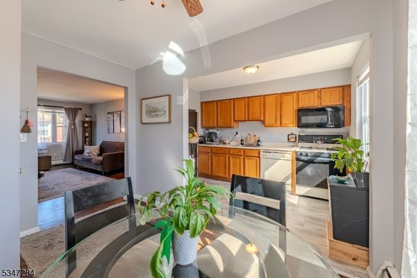 Dining room, Interior, Kitchen, Living room, Stainless Steel Appliances, Wood Texture Flooring