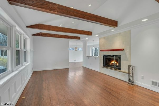 Empty room, Fireplace, Interior, Pendant Lights, Recessed Lighting, Wooden Beams, Wood Texture Flooring
