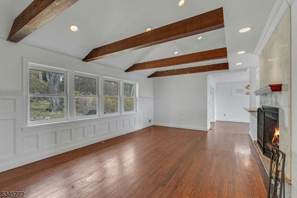 Empty room, Fireplace, Interior, Recessed Lighting, Wooden Beams, Wood Texture Flooring