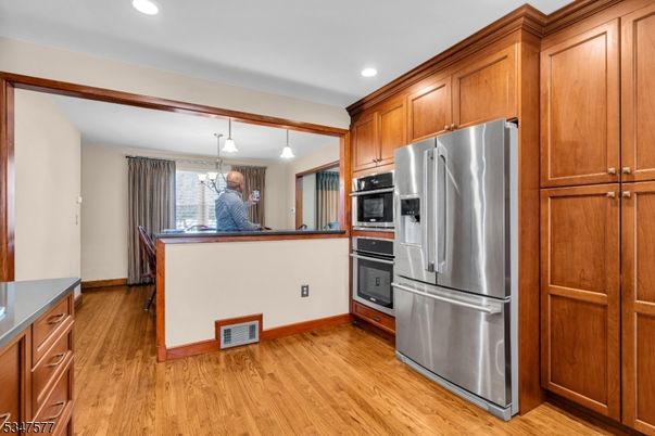 Dining room, Interior, Kitchen, Pendant Lights, Recessed Lighting, Stainless Steel Appliances, Wood Texture Flooring