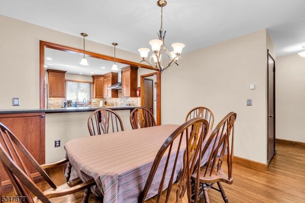 Chandelier, Dining room, Interior, Kitchen, Pendant Lights, Recessed Lighting, Wood Texture Flooring