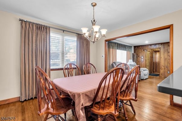 Chandelier, Dining room, Interior, Recessed Lighting, Wood Texture Flooring, Wooden Walls