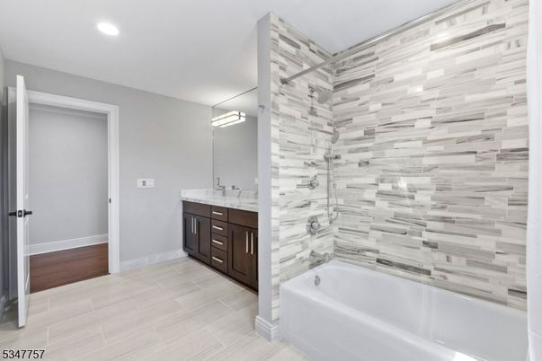 Bathroom, Dual Sink Vanities, Interior, Recessed Lighting, Wood Texture Flooring