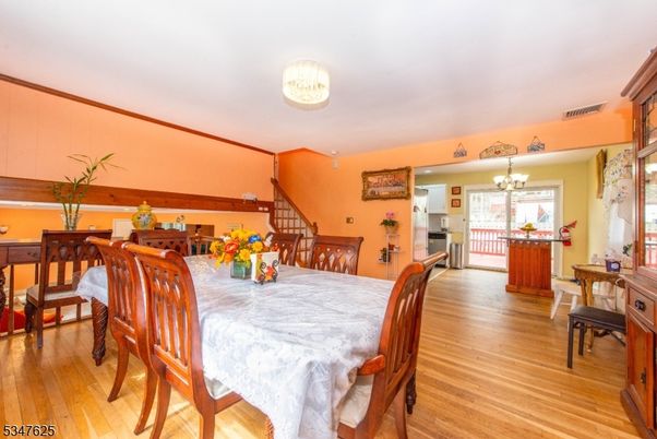 Chandelier, Dining room, Interior, Wood Texture Flooring