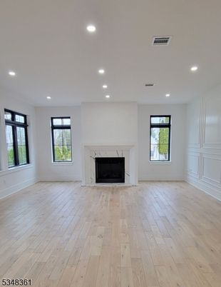 Empty room, Fireplace, Interior, Recessed Lighting, Wood Texture Flooring