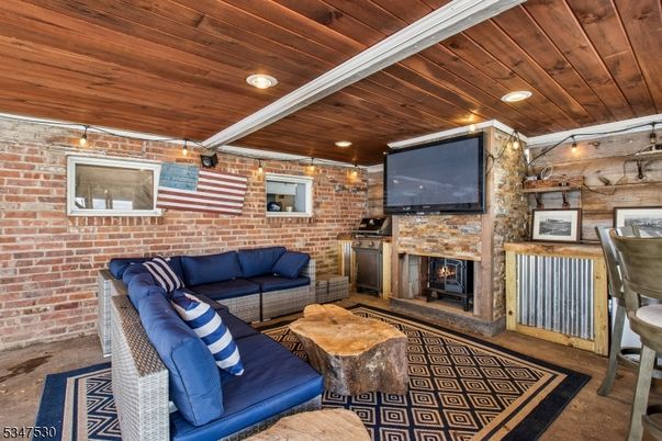 Fireplace, Interior, Living room, Recessed Lighting, Stone Walls, Wooden Ceilings