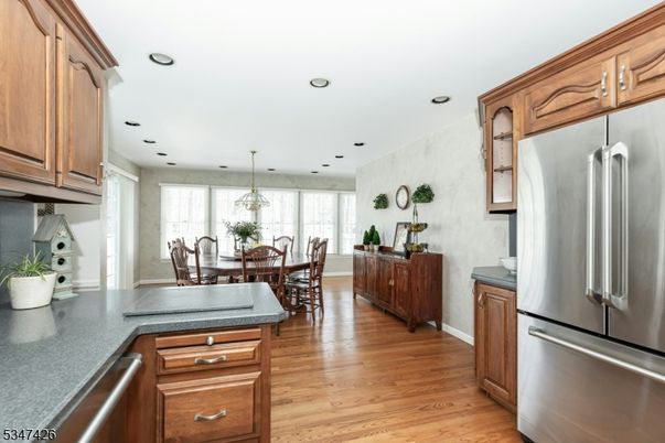Dining room, Interior, Kitchen, Pendant Lights, Recessed Lighting, Stainless Steel Appliances, Wood Texture Flooring