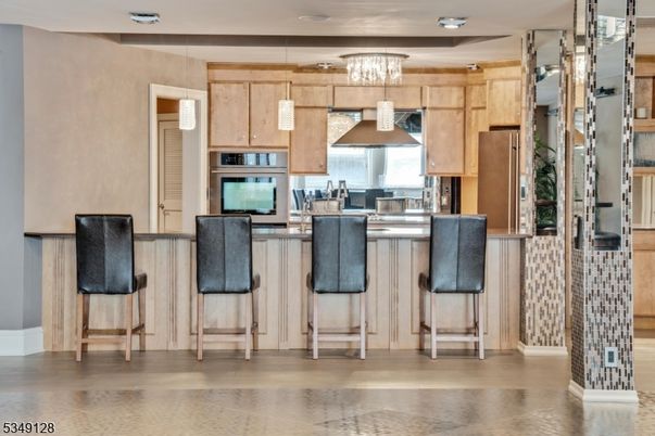 Chandelier, Interior, Kitchen, Pendant Lights, Recessed Lighting, Stainless Steel Appliances, Wood Texture Flooring
