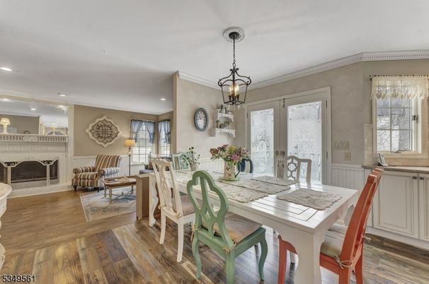 Dining room, Fireplace, Interior, Living room, Pendant Lights, Recessed Lighting, Wood Texture Flooring