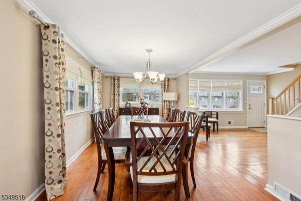 Chandelier, Dining room, Interior, Wood Texture Flooring