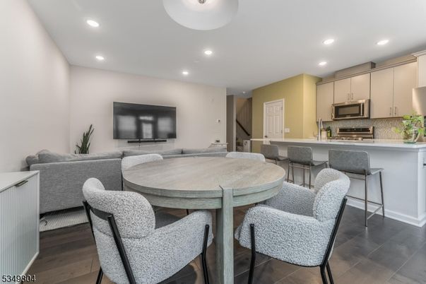 Dining room, Interior, Kitchen, Living room, Recessed Lighting, Stainless Steel Appliances, Wood Texture Flooring