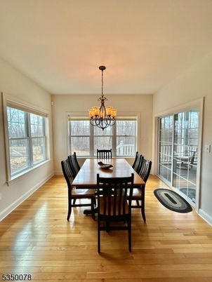 Chandelier, Dining room, Interior, Wood Texture Flooring