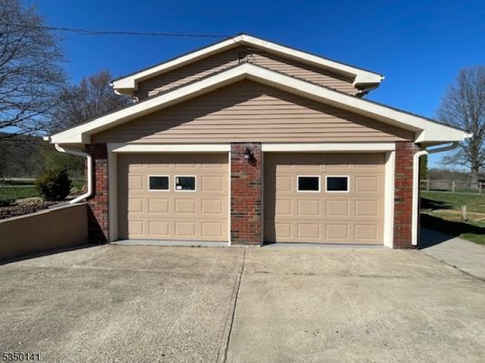 Attached, Exterior, Facade, Brick Facade, American Craftsman