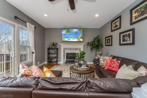 Fireplace, Interior, Living room, Recessed Lighting, Wood Texture Flooring