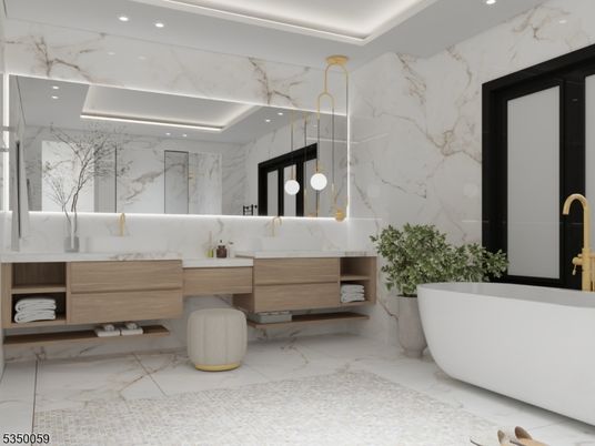 Bathroom, Dual Sink Vanities, Free Standing Baths, Interior, Marble, Marble Walls, Pendant Lights, Recessed Lighting