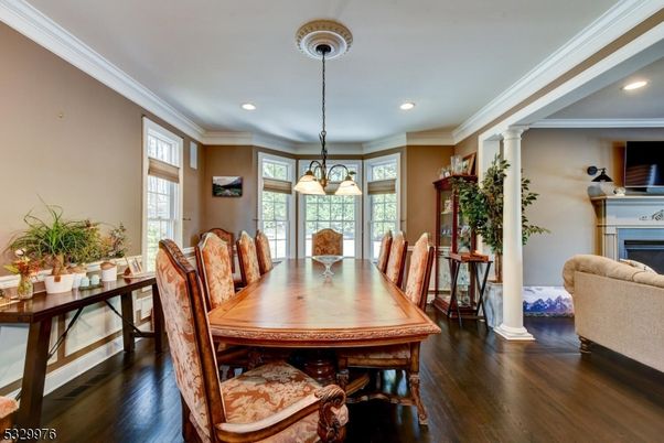 Dining room, Fireplace, Interior, Pendant Lights, Recessed Lighting, Wood Texture Flooring