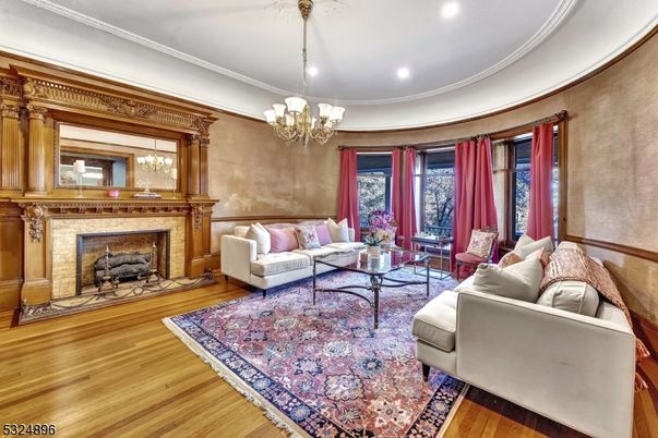 Chandelier, Fireplace, Interior, Living room, Recessed Lighting, Wood Texture Flooring