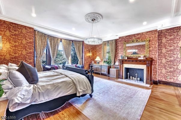 Bedroom, Fireplace, Interior, Recessed Lighting, Wood Texture Flooring