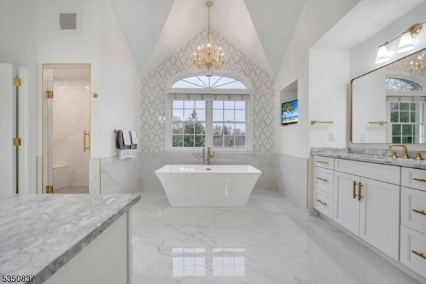 Bathroom, Dual Sink Vanities, Free Standing Baths, Glass Shower, Interior, Marble, Marble Walls, Pendant Lights
