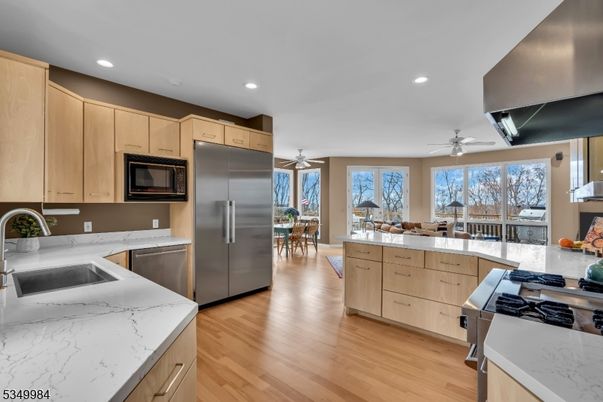 Dining room, Interior, Kitchen, Recessed Lighting, Stainless Steel Appliances, Wood Texture Flooring