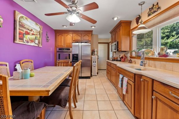 Interior, Kitchen, Pendant Lights, Recessed Lighting, Stainless Steel Appliances, Tile Countertops