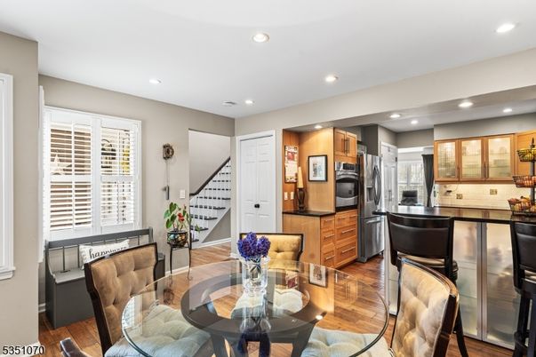 Dining room, Interior, Kitchen, Recessed Lighting, Stainless Steel Appliances, Wood Texture Flooring