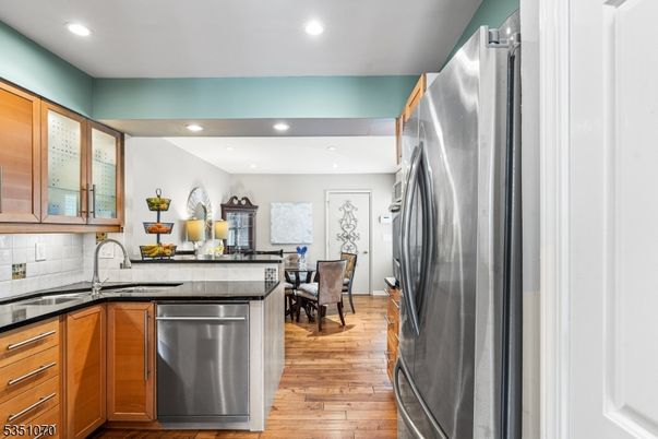 Dining room, Interior, Kitchen, Recessed Lighting, Stainless Steel Appliances, Wood Texture Flooring