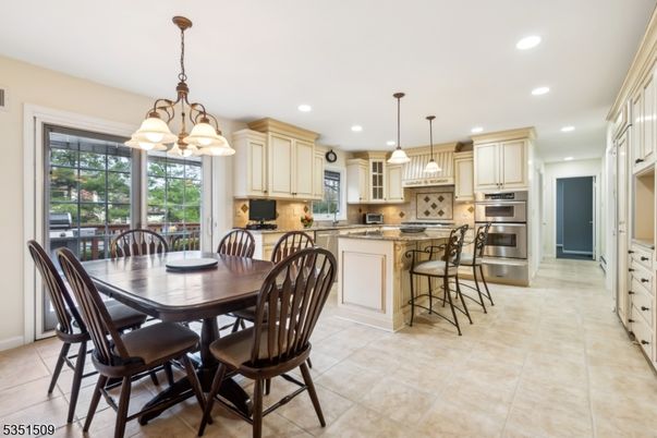 Chandelier, Dining room, Interior, Kitchen, Pendant Lights, Recessed Lighting, Stainless Steel Appliances