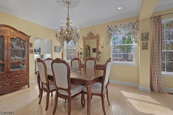 Chandelier, Dining room, Interior, Recessed Lighting, Wood Texture Flooring
