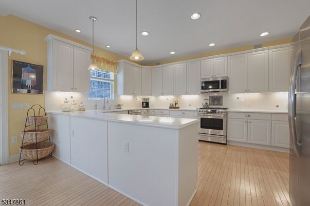 Interior, Kitchen, Pendant Lights, Recessed Lighting, Stainless Steel Appliances, Wood Texture Flooring
