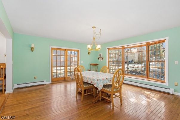 Chandelier, Dining room, Interior, Pendant Lights, Wood Texture Flooring